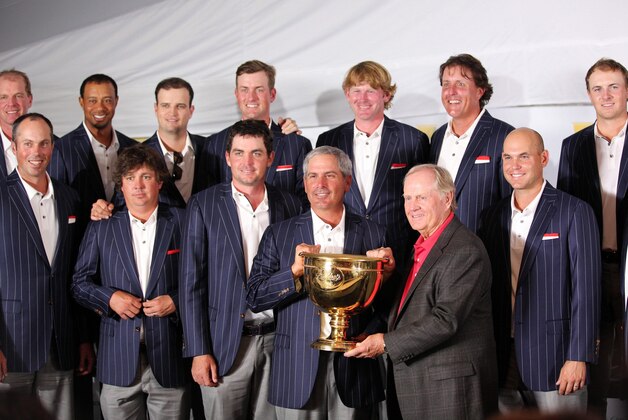Oct 6, 2013; Dublin, OH, USA; Fred Couple, Jack Nicklaus and the USA Team  pose with the Presidents Cup trophy after winning the Presidents Cup at Muirfield Village Golf Club. Mandatory Credit: Allan Henry-USA TODAY Sports