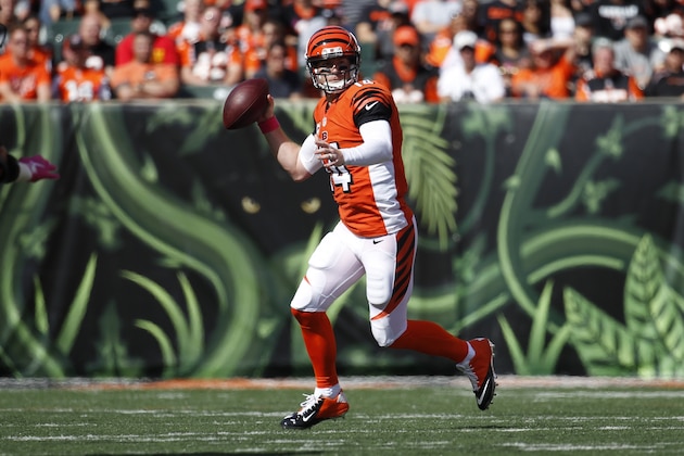 Cincinnati Bengals quarterback Andy Dalton (14) looks to pass in the second half of an NFL football game against the Kansas City Chiefs, Sunday, Oct. 4, 2015, in Cincinnati. (AP Photo/Frank Victores)
