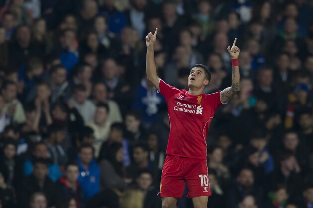 Liverpool's Philippe Coutinho celebrates after scoring during the English FA Cup sixth round replay soccer match between Blackburn and Liverpool at Ewood Park Stadium, Blackburn, England, Wednesday, April 8, 2015. (AP Photo/Jon Super)