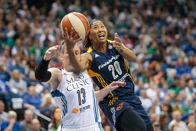 Oct 4, 2015; Minneapolis, MN, USA; Indiana Fever guard Briann January (20) shoots in the first quarter against Minnesota Lynx guard Lindsay Whalen (13) at Target Center. Mandatory Credit: Brad Rempel-USA TODAY Sports