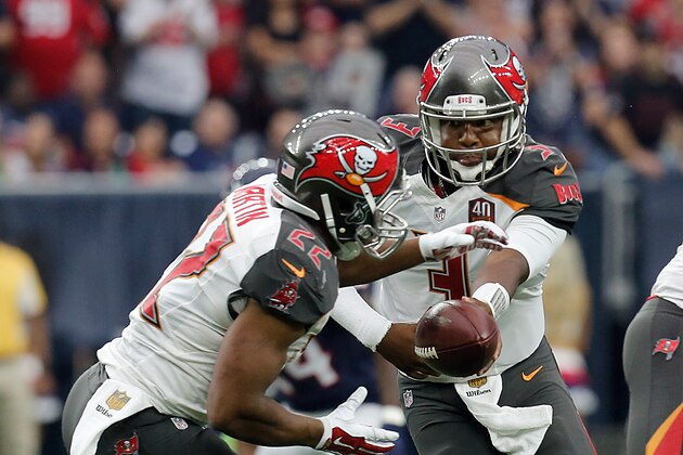 HOUSTON, TX - SEPTEMBER 27: Jameis Winston #3 of the Tampa Bay Buccaneers hands the ball off to Doug Martin #22 of the Tampa Bay Buccaneers against the Houston Texans on September 27, 2015 at NRG Stadium in Houston, Texas. Texans won 19 to 9.(Photo by Thomas B. Shea/Getty Images)
