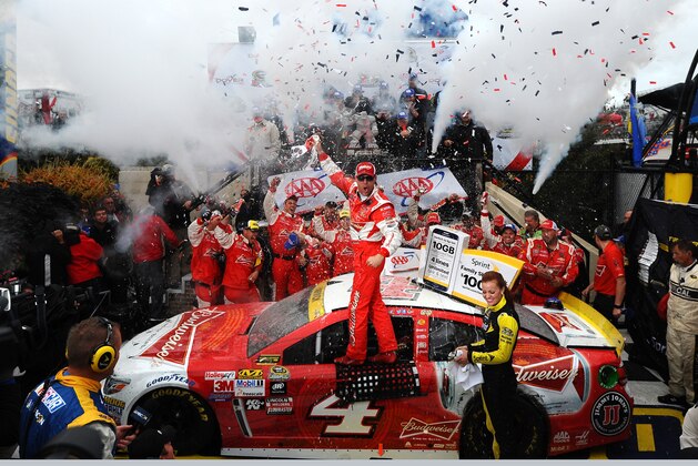 DOVER, DE - OCTOBER 04:  Kevin Harvick, driver of the #4 Budweiser/Jimmy John's Chevrolet, celebrates in victory lane after winning the NASCAR Sprint Cup Series AAA 400 at Dover International Speedway on October 4, 2015 in Dover, Delaware.  (Photo by Will Schneekloth/Getty Images)