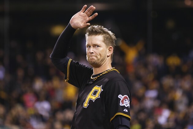 Pittsburgh Pirates starting pitcher A.J. Burnett (34) waves to the fans after being lifted in the seventh inning of a baseball game against the Cincinnati Reds, Saturday, Oct. 3, 2015, in Pittsburgh. This was Burnett's last start in regular season as he had announced earlier in the year he was retiring at the end of this season. (AP Photo/Keith Srakocic)