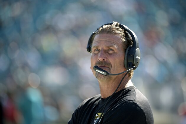 Jacksonville Jaguars offensive coordinator Greg Olson watches from the sideline during player introductions prior to an NFL football game against the Miami Dolphins in Jacksonville, Fla., Sunday, Sept. 20, 2015. (AP Photo/Phelan M. Ebenhack)