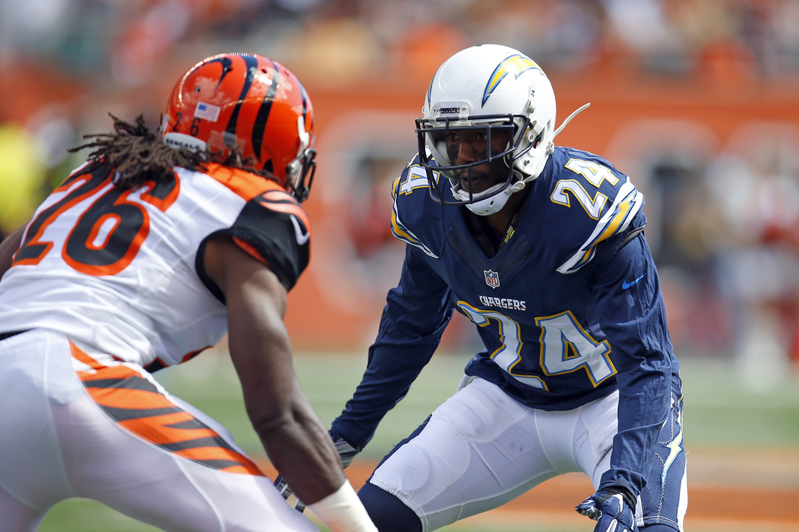 San Diego Chargers cornerback Brandon Flowers (24) defends Cincinnati Bengals cornerback Josh Shaw (26) during a punt in an NFL football game in Cincinnati, Sunday, Sept. 20, 2015. (Jeff Haynes/AP Images for Panini)