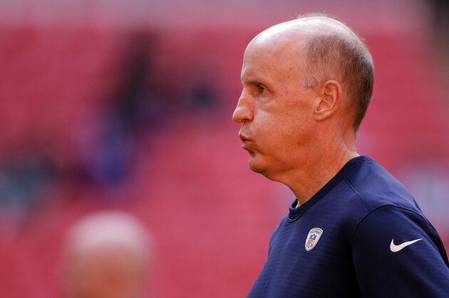 Miami Dolphins head coach Joe Philbin watches his team warm-up before the NFL football game between the New York Jets and the Miami Dolphins and at Wembley stadium in London, Sunday, Oct. 4, 2015. (AP Photo/Matt Dunham)