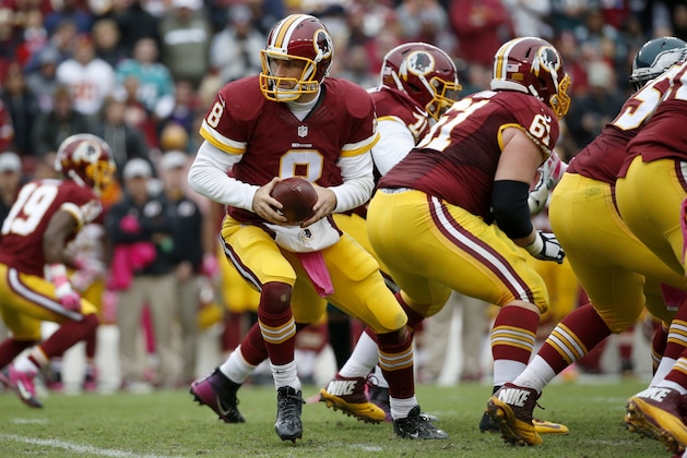 Washington Redskins quarterback Kirk Cousins (8) turns our of the pocket during the second half of an NFL football game against the Philadelphia Eagles in Landover, Md., Sunday, Oct. 4, 2015. (AP Photo/Alex Brandon)