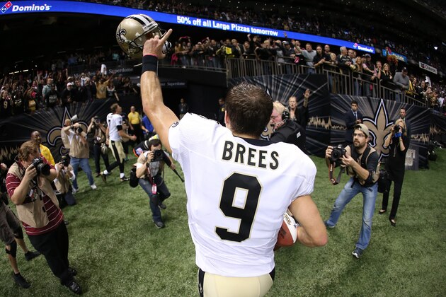 NEW ORLEANS, LA - OCTOBER 04:  Drew Brees #9 of the New Orleans Saints celebrates after defeating the Dallas Cowboys  at Mercedes-Benz Superdome on October 4, 2015 in New Orleans, Louisiana.  (Photo by Chris Graythen/Getty Images)