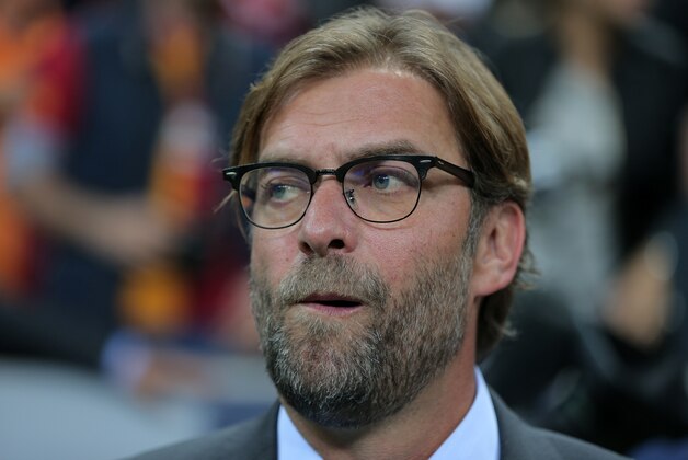 Coach Juergen Klopp of Borussia Dortmund watches their Champions League Group D soccer match against Galatasaray at the Turk Telekom Arena Stadium in Istanbul, Turkey, Wednesday, Oct. 22, 2014. (AP Photo)