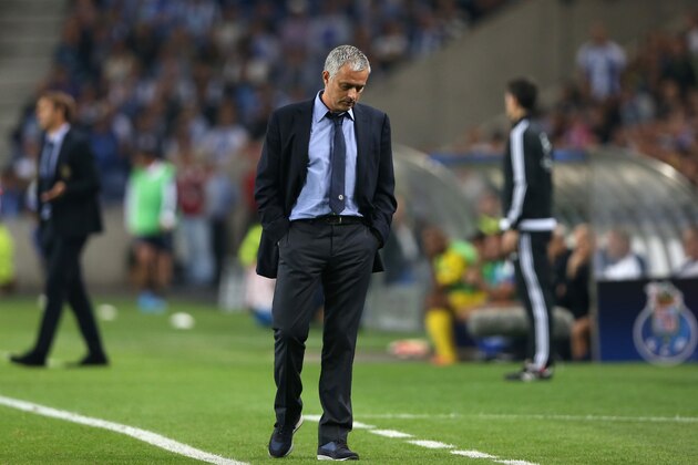 Chelsea manager Jose Mourinho walks on the sidelines during the Champions League group G soccer match between FC Porto and Chelsea FC at the Dragao stadium in Porto, Portugal, Tuesday, Sept. 29, 2015.  Porto won 2-1. (AP Photo/Steven Governo)