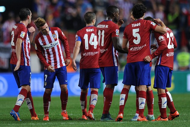 MADRID, SPAIN - OCTOBER 04:  Luciano Vietto of Club Atletico de Madrid celebrates with teammates after Atletico drew 1-1 against Real Madrid in the La Liga match between Club Atletico de Madrid and Real Madrid at Vicente Calderon Stadium on October 4, 2015 in Madrid, Spain.  (Photo by Denis Doyle/Getty Images)