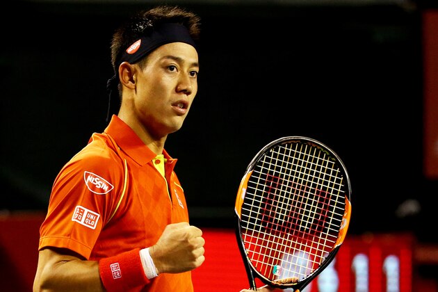 TOKYO, JAPAN - OCTOBER 05:  Kei Nishikori of Japan celebrates after winning the men's singles first round match against Borna Coric of Croatia  on day one of Rakuten Open 2015 at Ariake Colosseum on October 5, 2015 in Tokyo, Japan.  (Photo by Koji Watanabe/Getty Images)