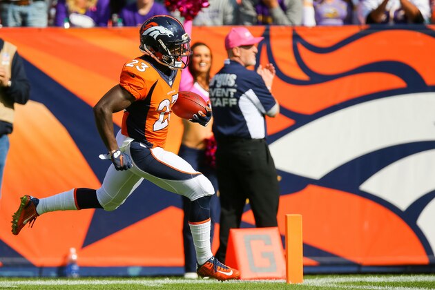 DENVER, CO - OCTOBER 4:  Running back Ronnie Hillman #23 of the Denver Broncos scores a touchdown on an 72 yard rush in the second quarter of a game against the Minnesota Vikings at Sports Authority Field at Mile High on October 4, 2015 in Denver, Colorado.  (Photo by Justin Edmonds/Getty Images)