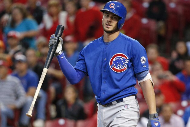 Chicago Cubs' Kris Bryant reacts after striking out in the first inning of a baseball game against the Cincinnati Reds, Wednesday, Sept. 30, 2015, in Cincinnati. The Cubs won 10-3. (AP Photo/John Minchillo)