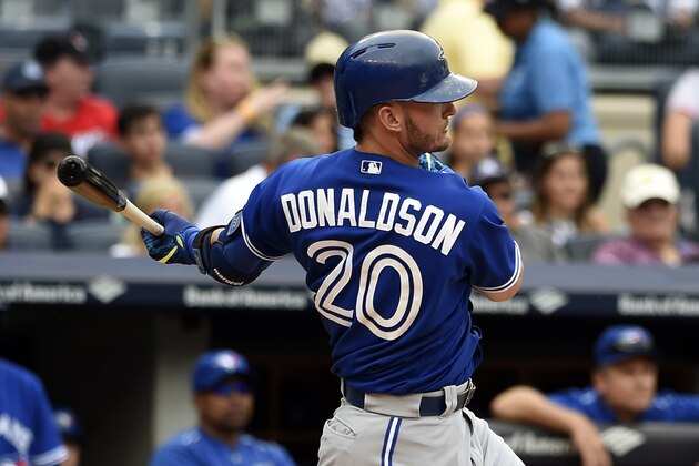Toronto Blue Jays' Josh Donaldson (20) at bat against the New York Yankees in the sixth inning of a baseball game at Yankee Stadium, Sunday, Sept. 13, 2015, in New York. (AP Photo/Kathy Kmonicek)