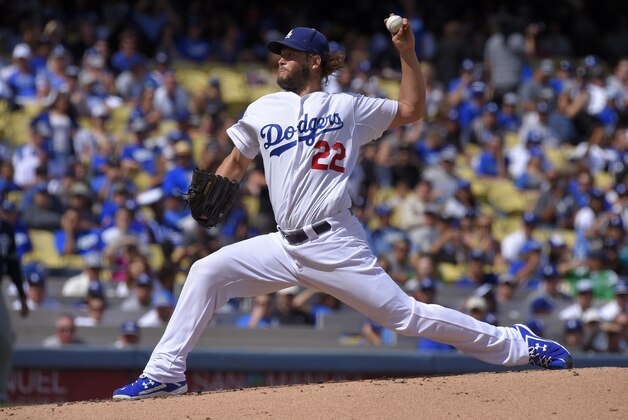 Los Angeles Dodgers starting pitcher Clayton Kershaw throws to the plate during the second inning of a baseball game against the Los Angeles Dodgers, Sunday, Oct. 4, 2015, in Los Angeles. (AP Photo/Mark J. Terrill)
