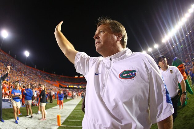 GAINESVILLE, FL - OCTOBER 03: Head coach Jim McElwain of the Florida Gators  waves to the crowd after the game against the Mississippi Rebels on October 3, 2015 in Gainesville, Florida.  (Photo by Rob Foldy/Getty Images)