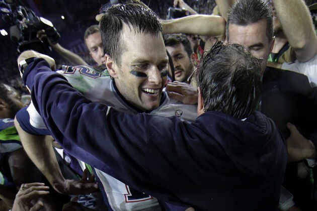 New England Patriots quarterback Tom Brady celebrates with head coach Bill Belichick after winning NFL Super Bowl XLIX football game against the Seattle Seahawks Sunday, Feb. 1, 2015, in Glendale, Ariz. The Patriots won 28-24. (AP Photo/Matt Slocum)
