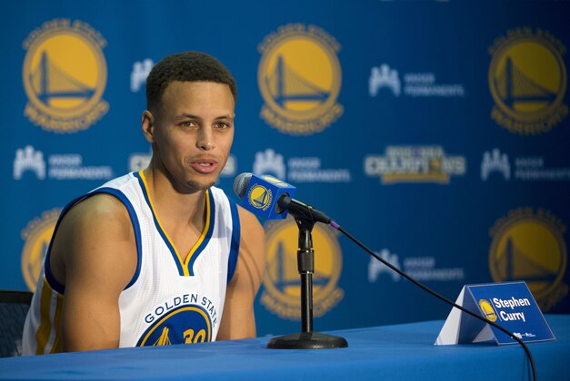 September 28, 2015; Oakland, CA, USA; Golden State Warriors guard Stephen Curry (30) addresses the media in a press conference during media day at the Warriors Practice Facility. Mandatory Credit: Kyle Terada-USA TODAY Sports
