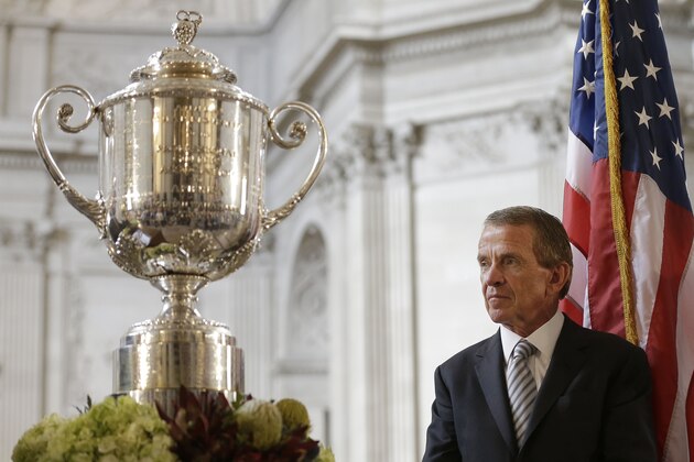 PGA Tour Commissioner Tim Finchem listens to speakers at a news conference announcing that TPC Harding Park will host the U.S. PGA Championship in 2020 and the Presidents Cup in 2025 at City Hall in San Francisco, Wednesday, July 2, 2014. TPC Harding Park will also host the Match Play Championship in 2015. (AP Photo/Jeff Chiu)