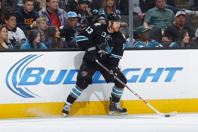SAN JOSE, CA - APRIL 26: Raffi Torres #13 of the San Jose Sharks skates with the puck against the Los Angeles Kings in Game Five of the First Round of the 2014 NHL Stanley Cup Playoffs at SAP Center on April 26, 2014 in San Jose, California. (Photo by Rocky Widner/Getty Images)