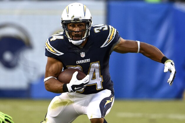 San Diego Chargers running back Donald Brown runs against the Seattle Seahawks during the second half of an NFL preseason football game Saturday, Aug. 29, 2015, in San Diego. (AP Photo/Denis Poroy)