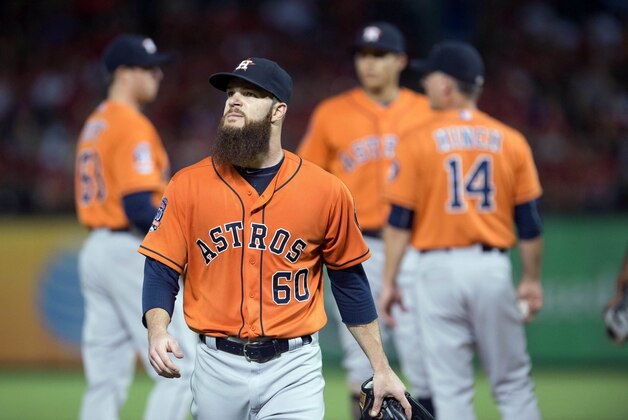 Sep 16, 2015; Arlington, TX, USA; Houston Astros starting pitcher Dallas Keuchel (60) is pulled from the game during the fifth inning against the Texas Rangers at Globe Life Park in Arlington. The Rangers defeat the Astros 14-3. Mandatory Credit: Jerome Miron-USA TODAY Sports