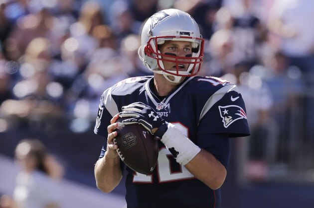 New England Patriots quarterback Tom Brady (12) sets to throw against the Jacksonville Jaguars in the first half of an NFL football game, Sunday, Sept. 27, 2015, in Foxborough, Mass. (AP Photo/Charles Krupa)