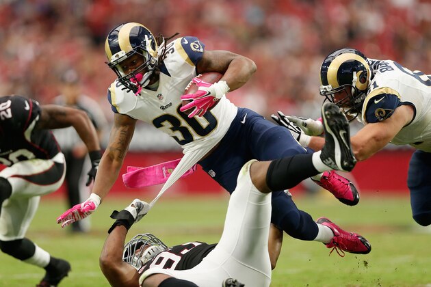 GLENDALE, AZ - OCTOBER 04: Running back Todd Gurley #30 of the St. Louis Rams is tripped up by defensive end Calais Campbell #93 of the Arizona Cardinals during the second half of the NFL game at the University of Phoenix Stadium on October 4, 2015 in Glendale, Arizona. (Photo by Christian Petersen/Getty Images) GLENDALE, AZ - OCTOBER 04: Running back Todd Gurley #30 of the St. Louis Rams is tripped up by defensive end Calais Campbell #93 of the Arizona Cardinals during the second half of the NFL game at the University of Phoenix Stadium on October 4, 2015 in Glendale, Arizona. (Photo by Christian Petersen/Getty Images)