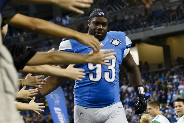 Detroit Lions defensive end Tyrunn Walker (93) during player introductions before an preseason NFL football game against the Buffalo Bills at Ford Field in Detroit, Thursday, Sept. 3, 2015. (AP Photo/Rick Osentoski)