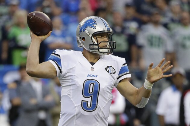 Detroit Lions quarterback Matthew Stafford passes in the first half of an NFL football game against the Seattle Seahawks, Monday, Oct. 5, 2015, in Seattle. (AP Photo/Elaine Thompson)