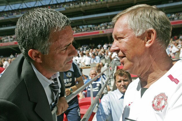 Chelsea's Portugese Manager Jose Mourinho (L) and Manchester United's Manager Sir Alex Ferguson (R) greet each other before their F.A Community Shield match football match at Wembley Stadium in London, 05 August 2007. AFP PHOTO/CARL DE SOUZA (Photo credit should read CARL DE SOUZA/AFP/Getty Images)