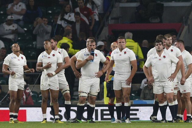 England players react after losing 33-13 in the Rugby World Cup Pool A match between England and Australia at Twickenham stadium in London, Saturday, Oct. 3, 2015. (AP Photo/Christophe Ena)