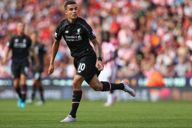 STOKE ON TRENT, ENGLAND - AUGUST 09:  Philippe Coutinho of Liverpool looks on as he scores their first goal during the Barclays Premier League match between Stoke City and Liverpool at Brittania Stadium on August 9, 2015 in Stoke on Trent, England.  (Photo by Clive Brunskill/Getty Images)