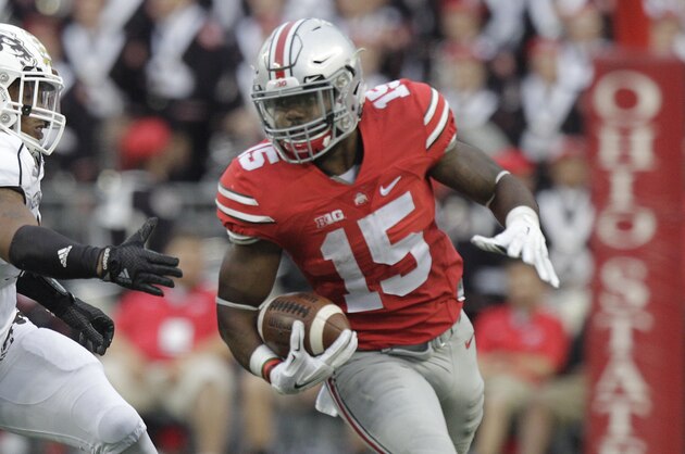 Ohio State running back Ezekiel Elliott plays against Western Michigan during an NCAA college football game Saturday, Sept. 26, 2015, in Columbus, Ohio. (AP Photo/Jay LaPrete)