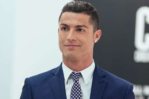 GUIMARAES, PORTUGAL - OCTOBER 5:  Cristiano Ronaldo makes his catwalk debut to model new styles at the global launch of his FW15 CR7 Footwear collection on October 5, 2015 in Guimaraes, Portugal. (Photo by CR7 Footwear via Getty images)