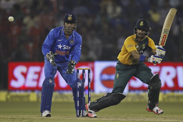 South Africa's Jean-Paul Duminy plays a shot during their second Twenty20 cricket match against India in Cuttack, India, Monday, Oct. 5, 2015. (AP Photo/Biswaranjan Rout)