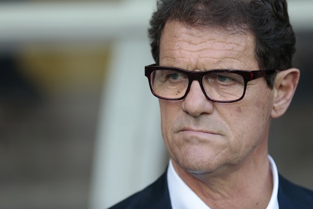FILE - In this June  14, 2015 file photo, Russia’s coach Fabio Capello watches his players during the Euro 2016 qualifying soccer match between Russia and Austria, in Moscow, Russia. The Russian Football Union says national team coach Capello has resigned following a dispute over back pay. In a statement released Monday, July 13, 2015, the Russian Football Union did not disclose the financial terms of the settlement but expressed gratitude to Capello for his work. (AP Photo/Ivan Sekretarev, file)