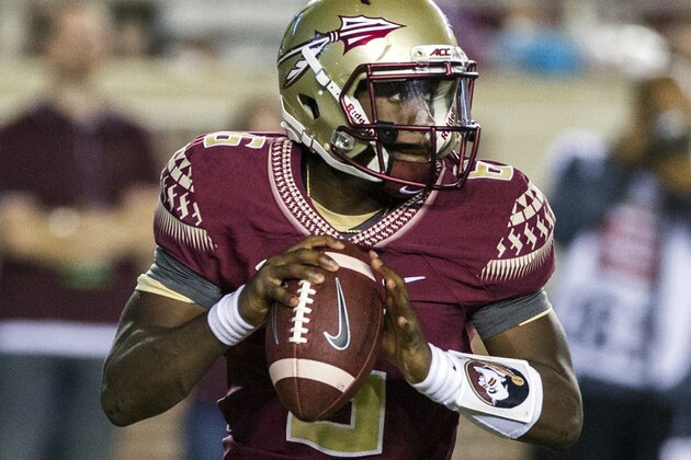 FILE - In this Sept. 5, 2015, file photo, Florida State quarterback Everett Golson rolls out to pass during the first half of an NCAA college football game against Texas State in Tallahassee, Fla. Golson has been strong in the second half of both of Florida State's games, but his adjustment to the offense remains a work in progress. Golson faces a familiar opponent though this week in Boston College. (AP Photo/Mark Wallheiser, File)