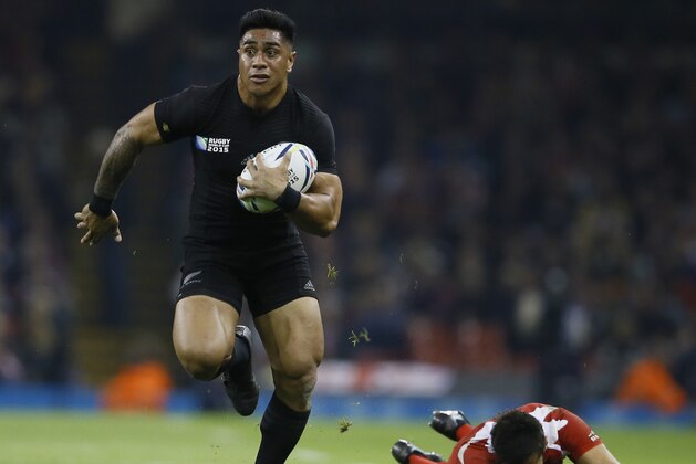 New Zealand's Malakai Fekitoa runs with the ball to score a try during the Rugby World Cup Pool C match between New Zealand and Georgia at the Millennium Stadium, Cardiff, Friday, Oct. 2, 2015. (AP Photo/Kirsty Wigglesworth)