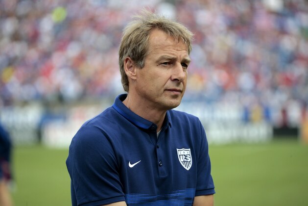 United States head coach Jurgen Klinsmann watches his team warm up before a friendly soccer match Friday, July 3, 2015, in Nashville, Tenn. (AP Photo/Mark Humphrey)