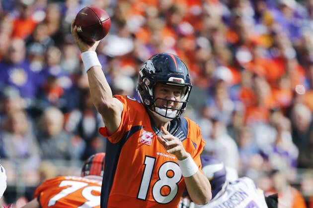 Denver Broncos quarterback Peyton Manning passes against the Minnesota Vikings during the first half of an NFL football game, Sunday, Oct. 4, 2015, in Denver. (AP Photo/Jack Dempsey)