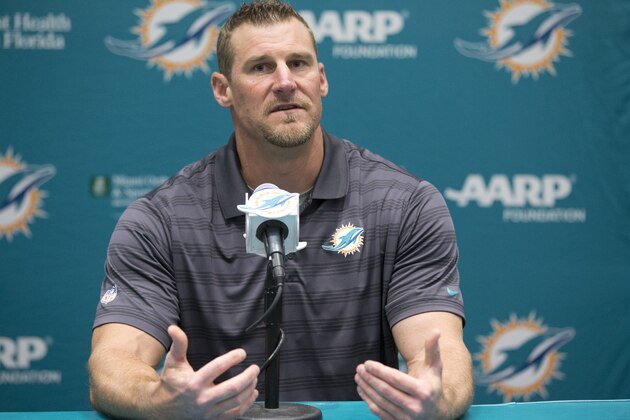 Former Miami Dolphins tight ends coach Dan Campbell speaks during a news conference after being promoted to interim head coach, Monday, Oct. 5, 2015 in Davie, Fla. Joe Philbin has been fired four games into his fourth season as coach of the Dolphins, and one day after a flop on an international stage that helped to seal his fate. (AP Photo/Wilfredo Lee)