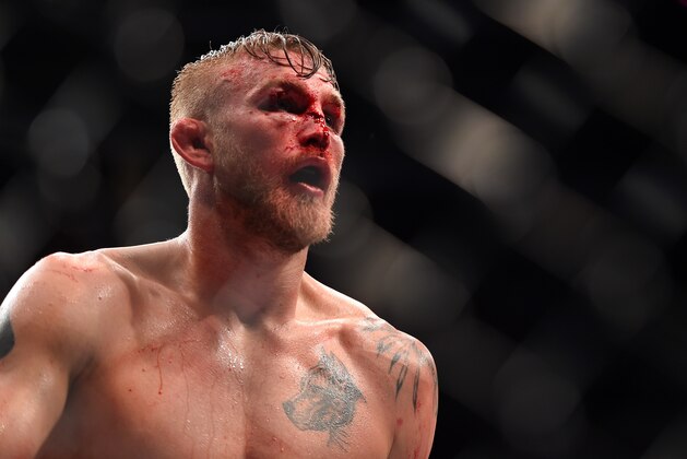 HOUSTON, TX - OCTOBER 03:  Alexander Gustafsson walks to his corner between rounds against Daniel Cormier in their UFC light heavyweight championship bout during the UFC 192 event at the Toyota Center on October 3, 2015 in Houston, Texas. (Photo by Jeff Bottari/Zuffa LLC/Zuffa LLC via Getty Images)