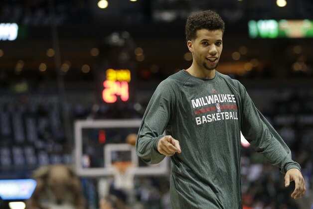 Milwaukee Bucks' Michael Carter-Williams smiles before Game 6 of an NBA basketball first-round playoff series against the Chicago Bulls Thursday, April 30, 2015, in Milwaukee.