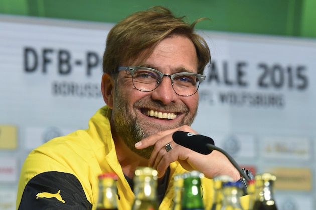 Head coach of German Bundesliga football club Borussia Dortmund, Juergen Klopp, smiles during a press conference on the eve of the German DFB Cup Final 2015 match Borussia Dortmund vs VfL Wolfsburg on May 29, 2015, in Berlin, Germany. The German DFB Cup Final 2015 match will take place on May 30, 2015.  AFP PHOTO / TOBIAS SCHWARZ        (Photo credit should read TOBIAS SCHWARZ/AFP/Getty Images)