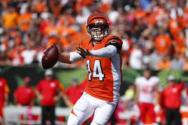 Cincinnati Bengals quarterback Andy Dalton passes in the second half of an NFL football game against the Kansas City Chiefs, Sunday, Oct. 4, 2015, in Cincinnati. (AP Photo/Paul Sancya)
