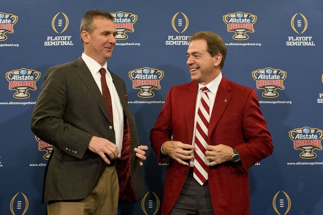 Ohio State coach Urban Meyer, left, and Alabama coach Nick Saban laugh during a press conference at the Marriott downtown convention center in New Orleans, Wednesday, Dec. 31, 2014. Ohio State is slated to square off against Alabama in the Sugar Bowl on New Year's Day. (AP Photo/Brynn Anderson)