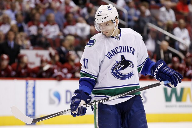 Vancouver Canucks' Radim Vrbata, of the Czech Republic, looks down at his stick during the third period of an NHL hockey game against the Arizona Coyotes Sunday, March 22, 2015, in Glendale, Ariz.  The Canucks defeated the Coyotes 3-1. (AP Photo/Ross D. Franklin)