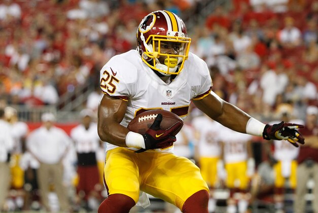 Aug 28, 2014; Tampa, FL, USA; Washington Redskins running back Chris Thompson (25) runs with the ball against the Tampa Bay Buccaneers during the first half at Raymond James Stadium. Mandatory Credit: Kim Klement-USA TODAY Sports